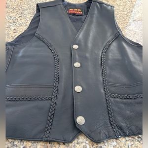 Leather vest with veteran/US Navy patches